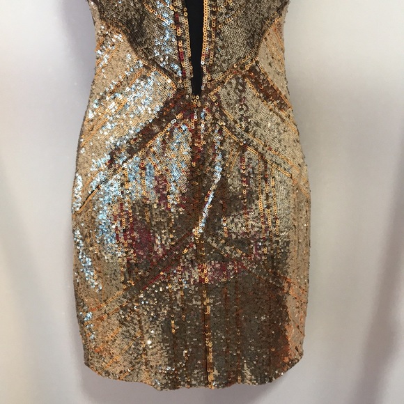 Bebe sequin dress. Low front plunge with a mesh back. - Picture 3 of 10